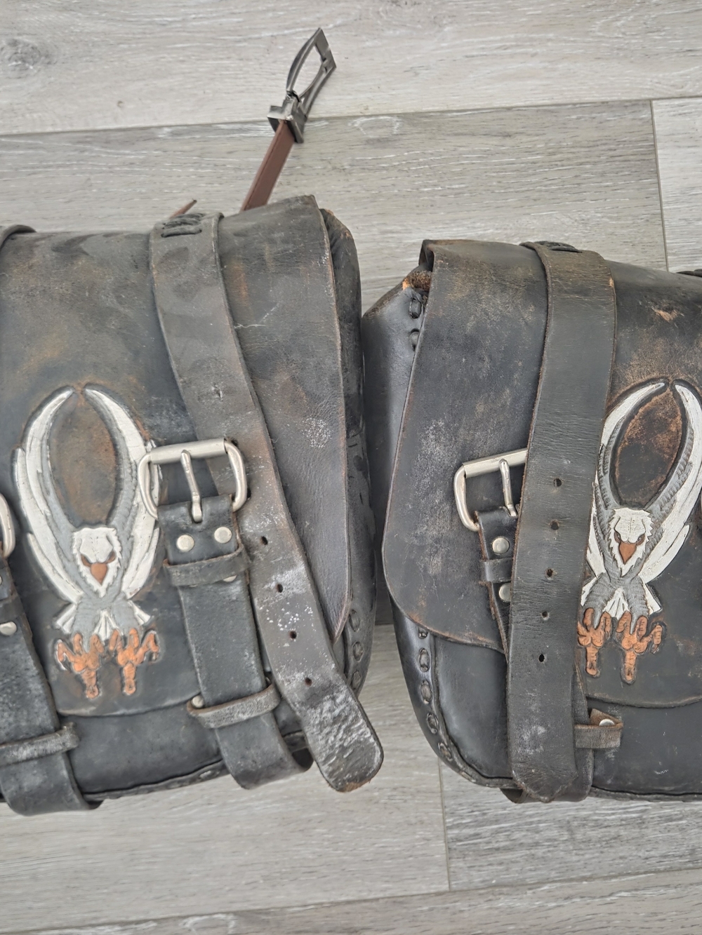 Source Unknown.Leather Motorcycke Saddle Bags with White/Orange Eagle Embroider